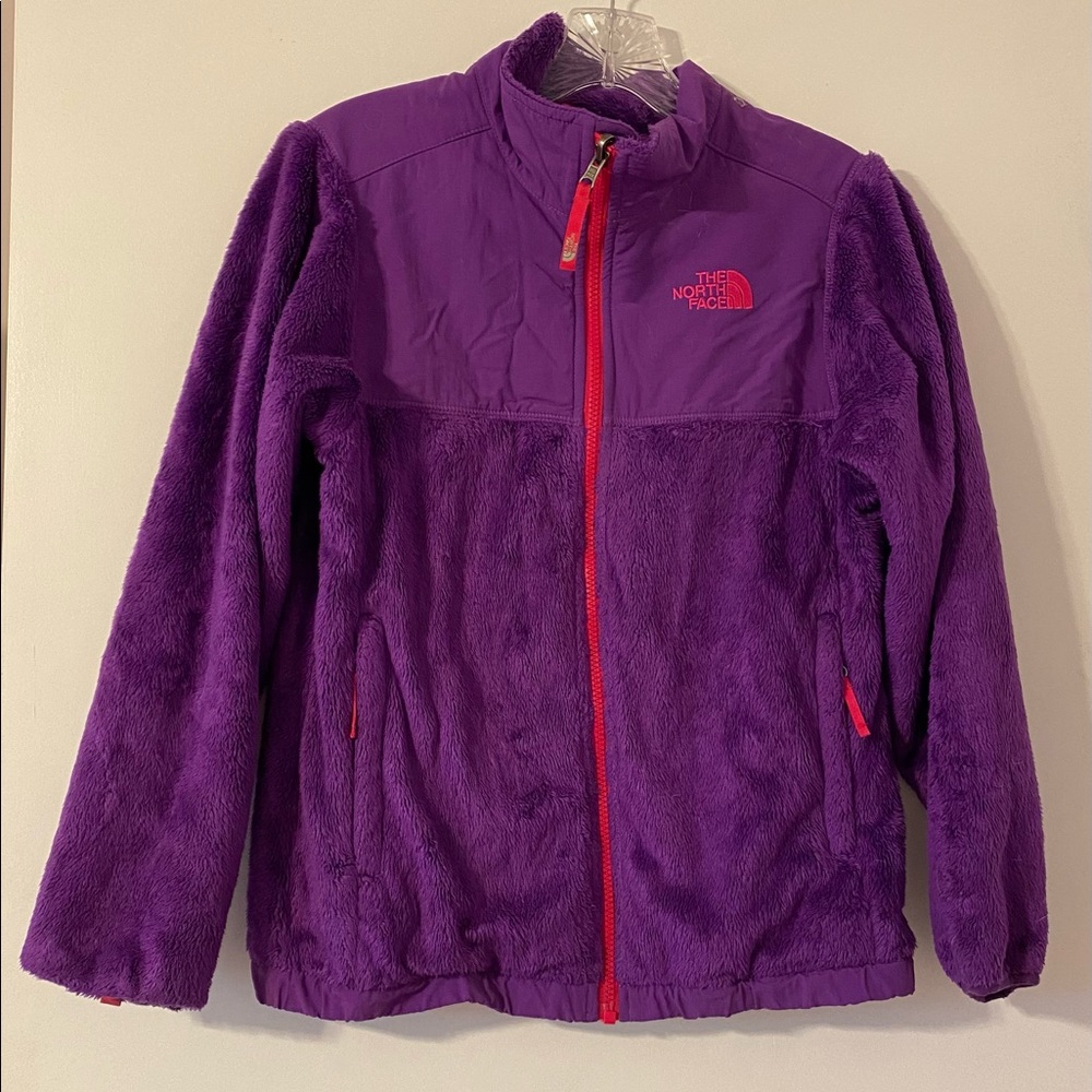 A purple north face jacket. Good condition. Size large. Girls jacket.